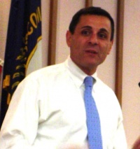 Dr. Dan Mongiardo tells crowd - Stand up for big ideas.