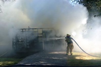 Fulton building fire destroys outbuilding