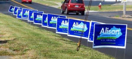 Grimes Outguns McConnell in Road Signs