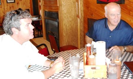 Brad Thompson, left, meets with Fulton County Judge David Gallagher