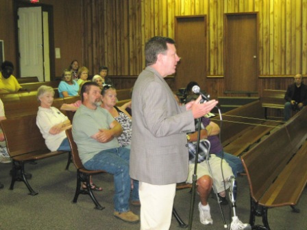 Hickman County Judge Executive Greg Pruitt - councilman Beck is seated next to him