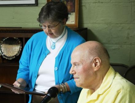 Historical Society Chair LaDonna Lathem presents plaque to John Kelly Ross