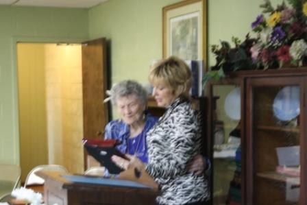 Poet Sheri Roberts presents Dorothy Nell Harper with Jackson Purchase Poet Laureate award